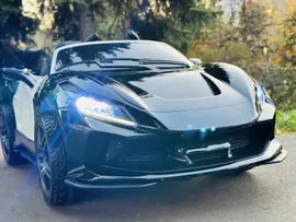 Детский электромобиль спортивный Ferrari F8 с пультом управления (черно-белый)